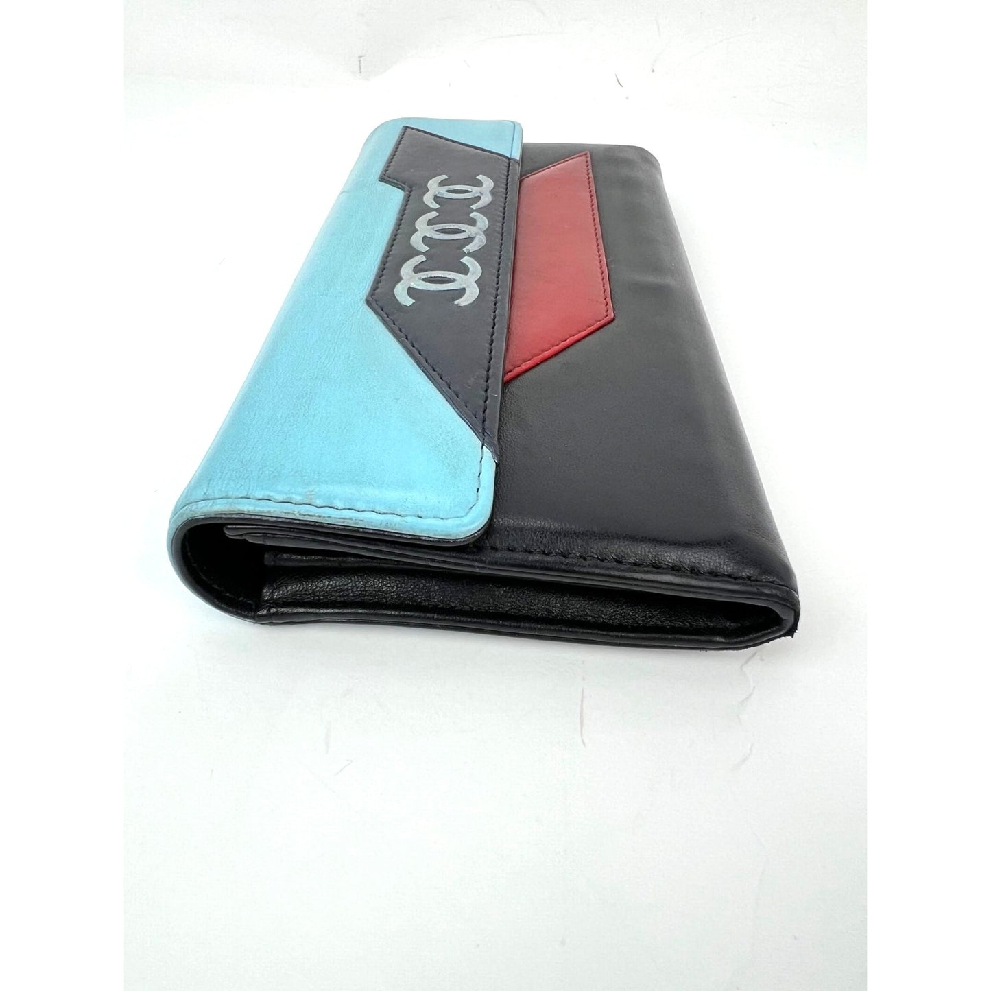 
                  
                    Chanel Airline Triple CC Logo Long Wallet Clutch
                  
                