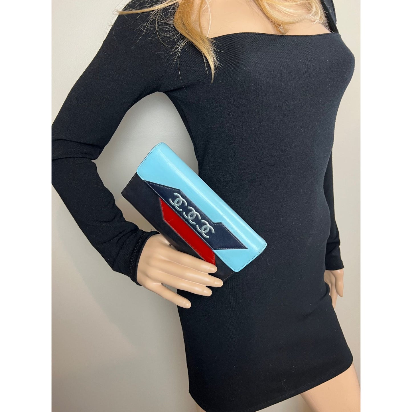 
                  
                    Chanel Airline Triple CC Logo Long Wallet Clutch
                  
                