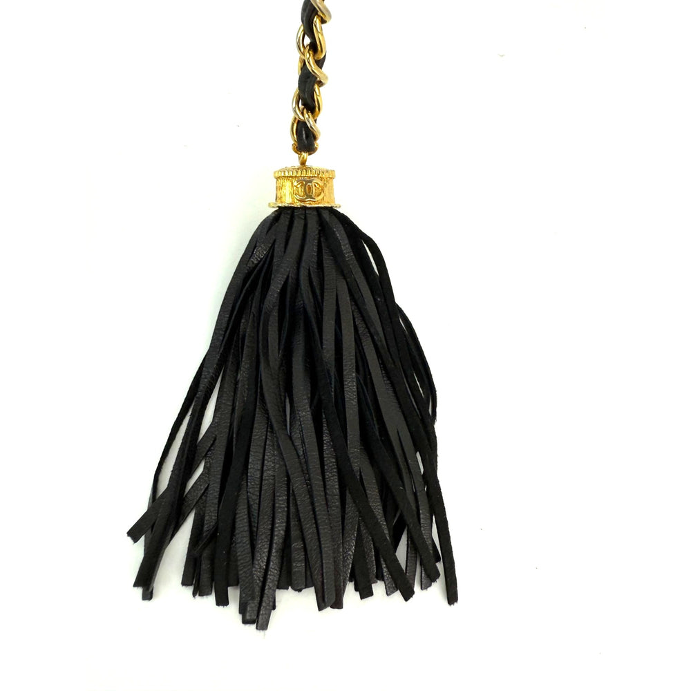 
                  
                    Chanel Lambskin Diamond Quilted CC Tassel Black Clutch Bag
                  
                