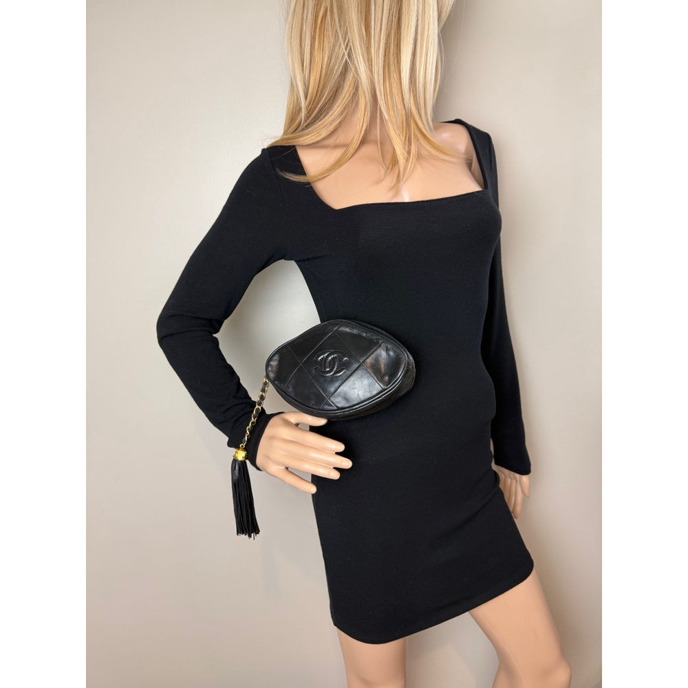 
                  
                    Chanel Lambskin Diamond Quilted CC Tassel Black Clutch Bag
                  
                
