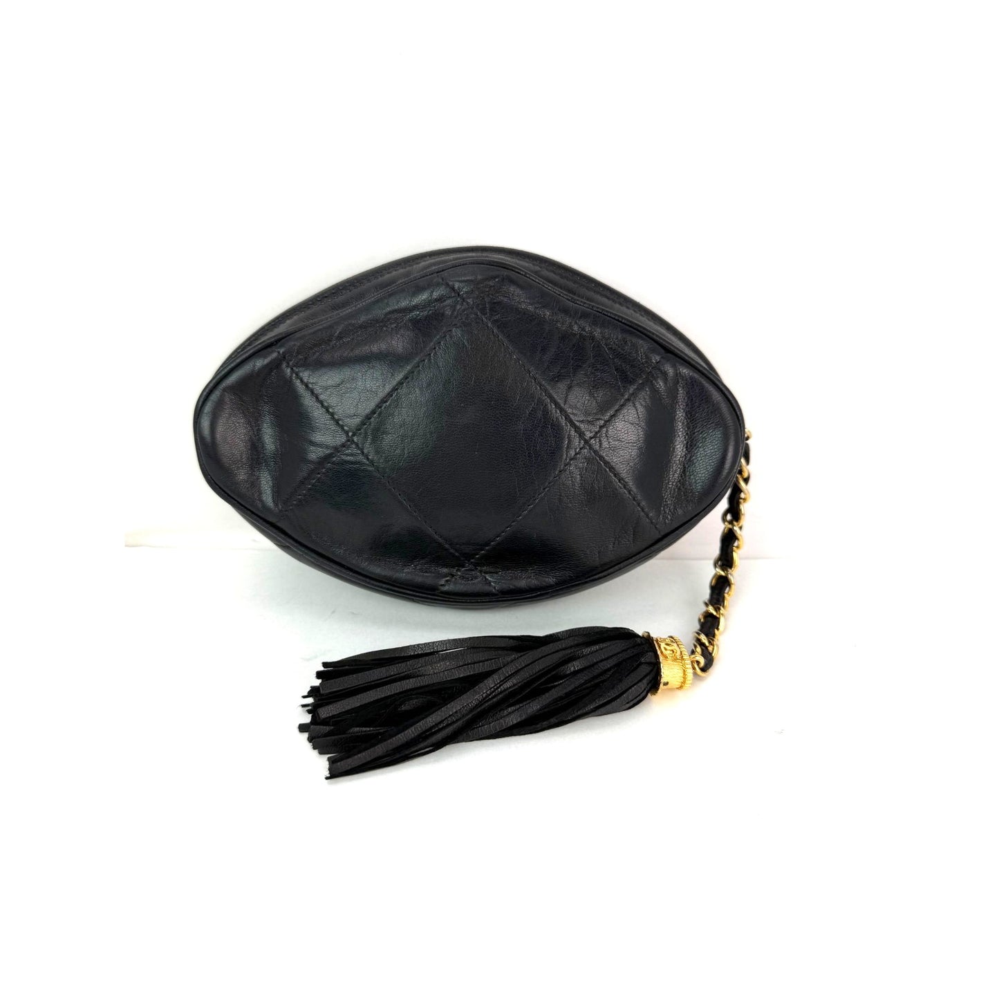 
                  
                    Chanel Lambskin Diamond Quilted CC Tassel Black Clutch Bag
                  
                