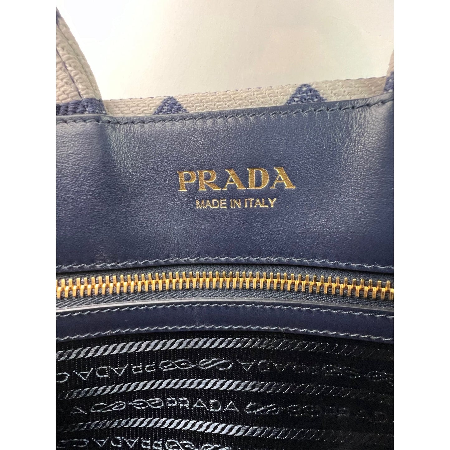 
                  
                    Prada Small Symbole Embroidered Fabric Handbag
                  
                