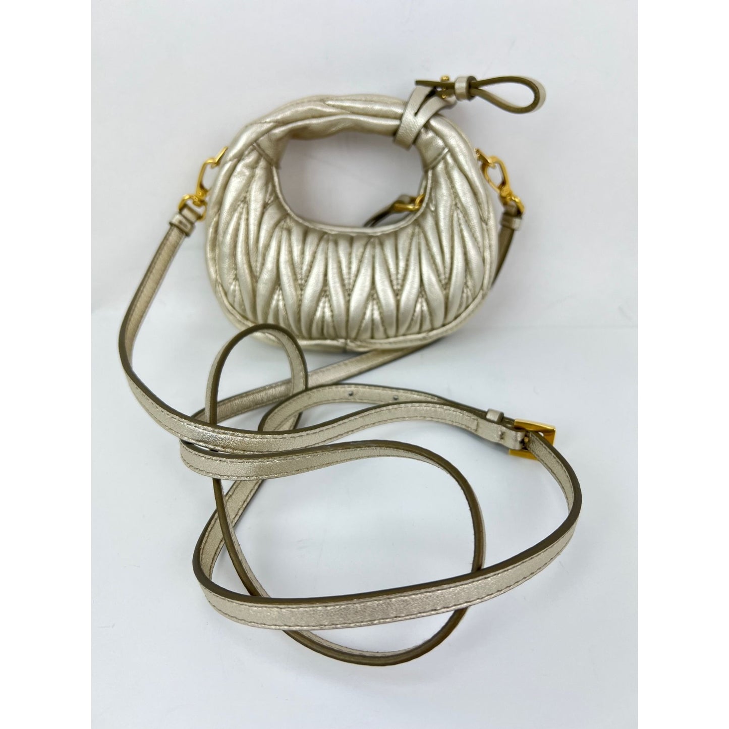 
                  
                    Miu Miu Wander Matelassé Nappa Leather Metallic Micro Hobo Crossbody
                  
                