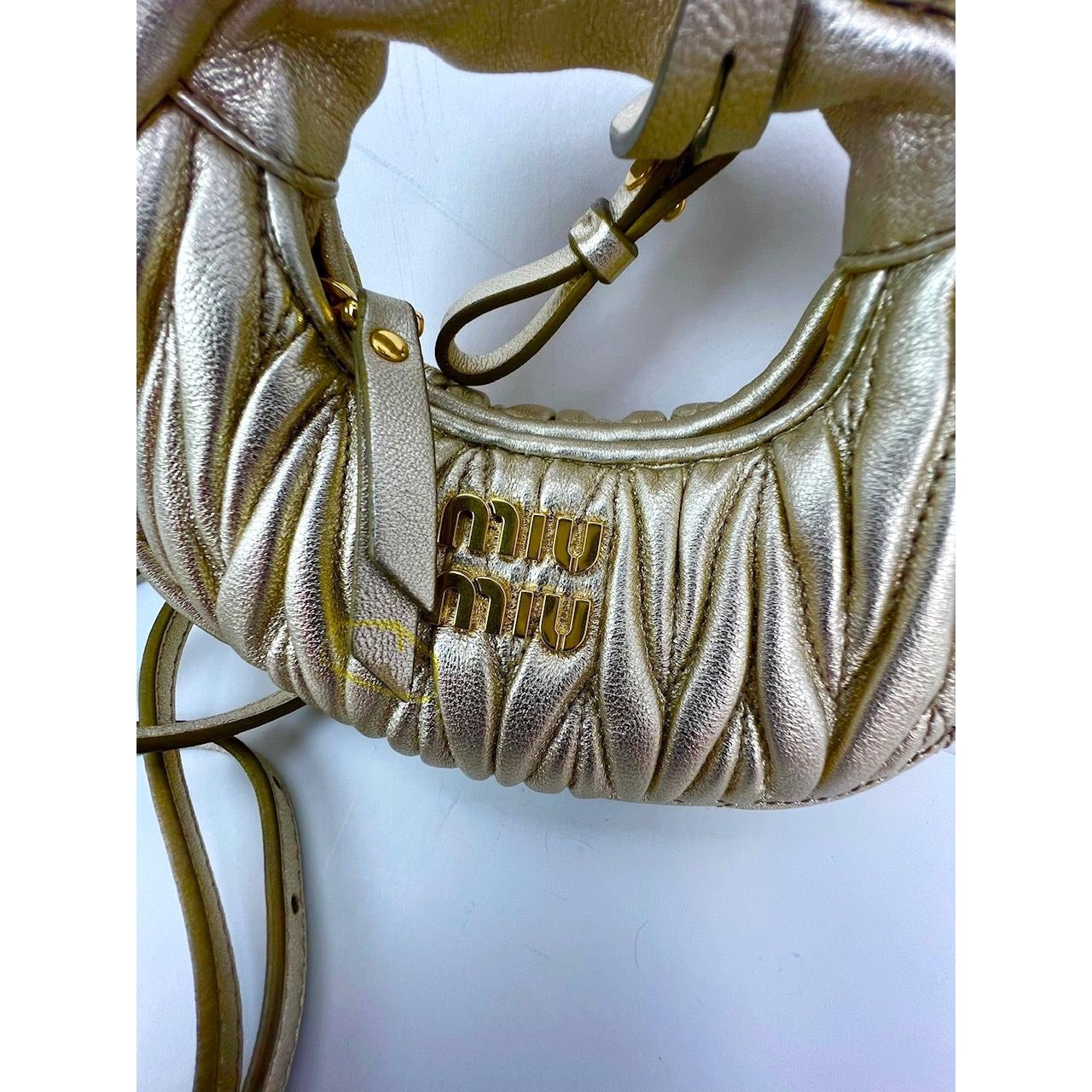 
                  
                    Miu Miu Wander Matelassé Nappa Leather Metallic Micro Hobo Crossbody
                  
                