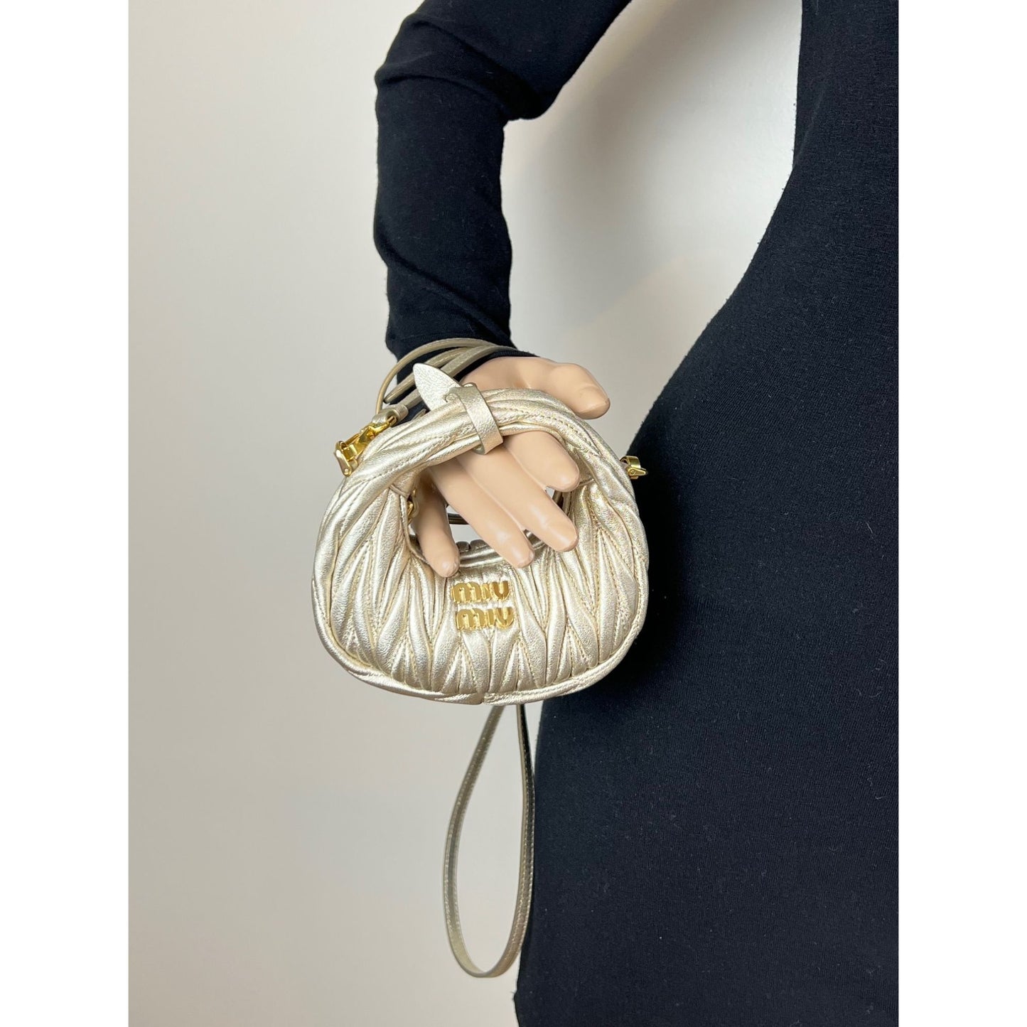 
                  
                    Miu Miu Wander Matelassé Nappa Leather Metallic Micro Hobo Crossbody
                  
                