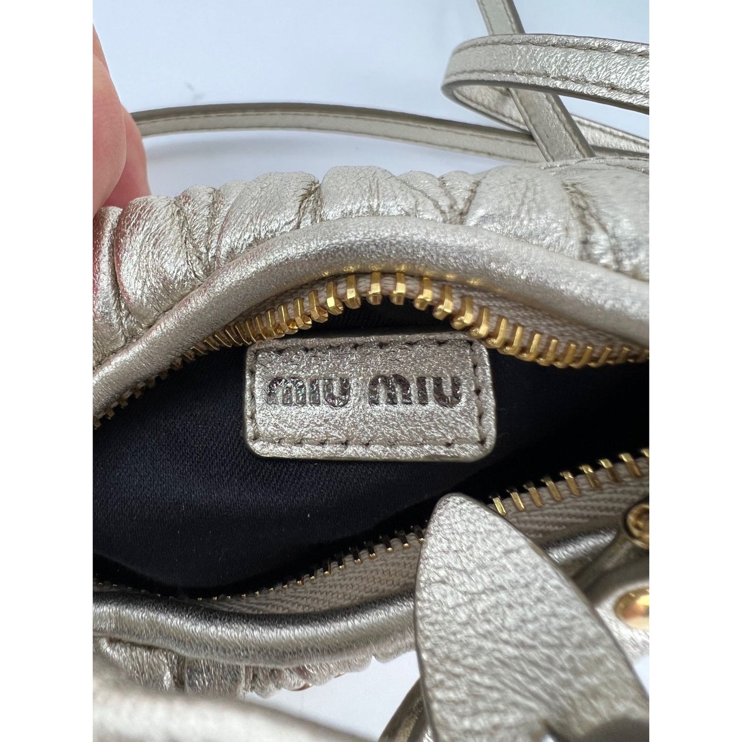 
                  
                    Miu Miu Wander Matelassé Nappa Leather Metallic Micro Hobo Crossbody
                  
                