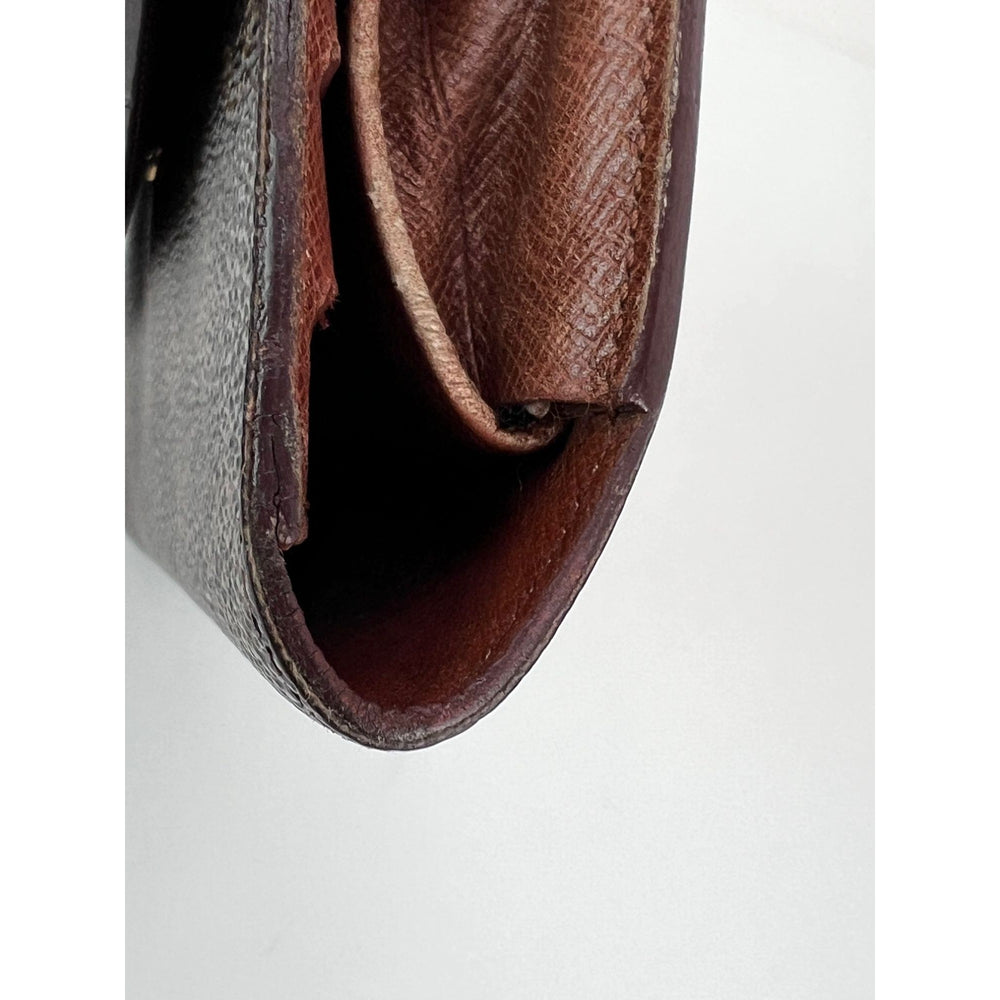 
                  
                    Louis Vuitton Vintage International Long Monogram Wallet
                  
                