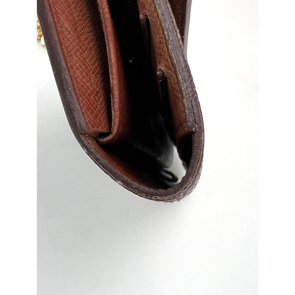 
                  
                    Louis Vuitton Vintage International Long Monogram Wallet
                  
                