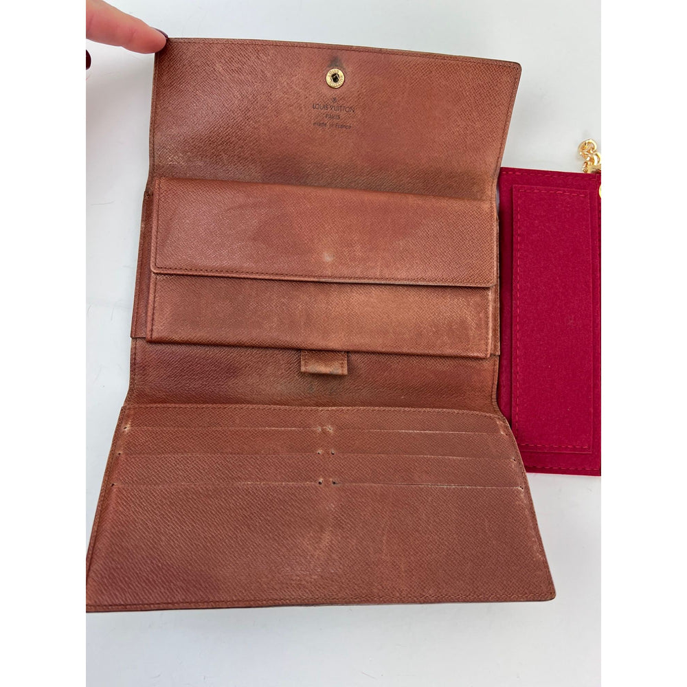 
                  
                    Louis Vuitton Vintage International Long Monogram Wallet
                  
                