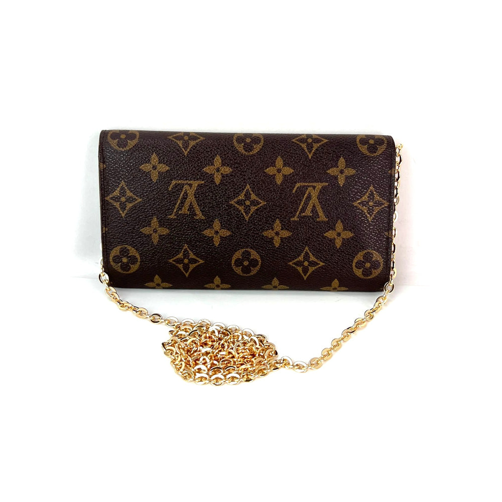 
                  
                    Louis Vuitton Vintage International Long Monogram Wallet
                  
                