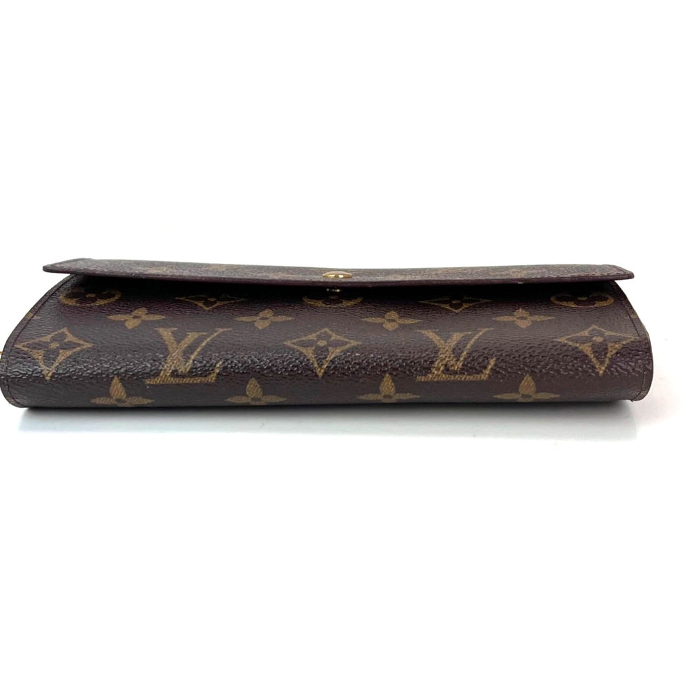
                  
                    Louis Vuitton Vintage International Long Monogram Wallet
                  
                