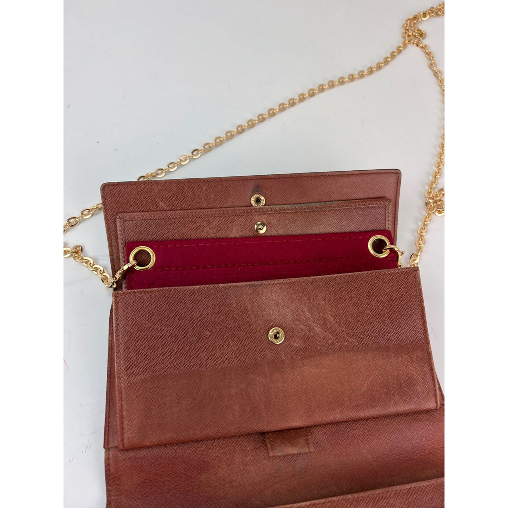 
                  
                    Louis Vuitton Vintage International Long Monogram Wallet
                  
                