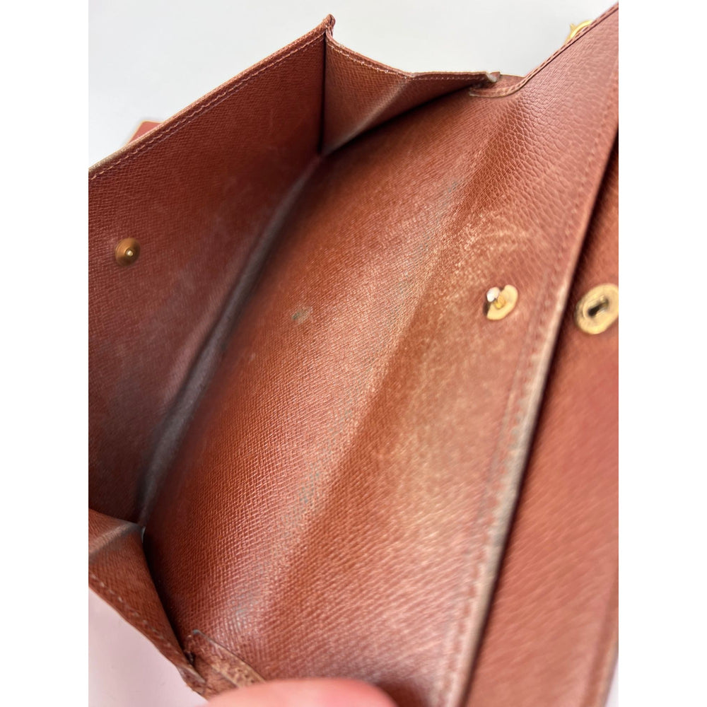 
                  
                    Louis Vuitton Vintage International Long Monogram Wallet
                  
                