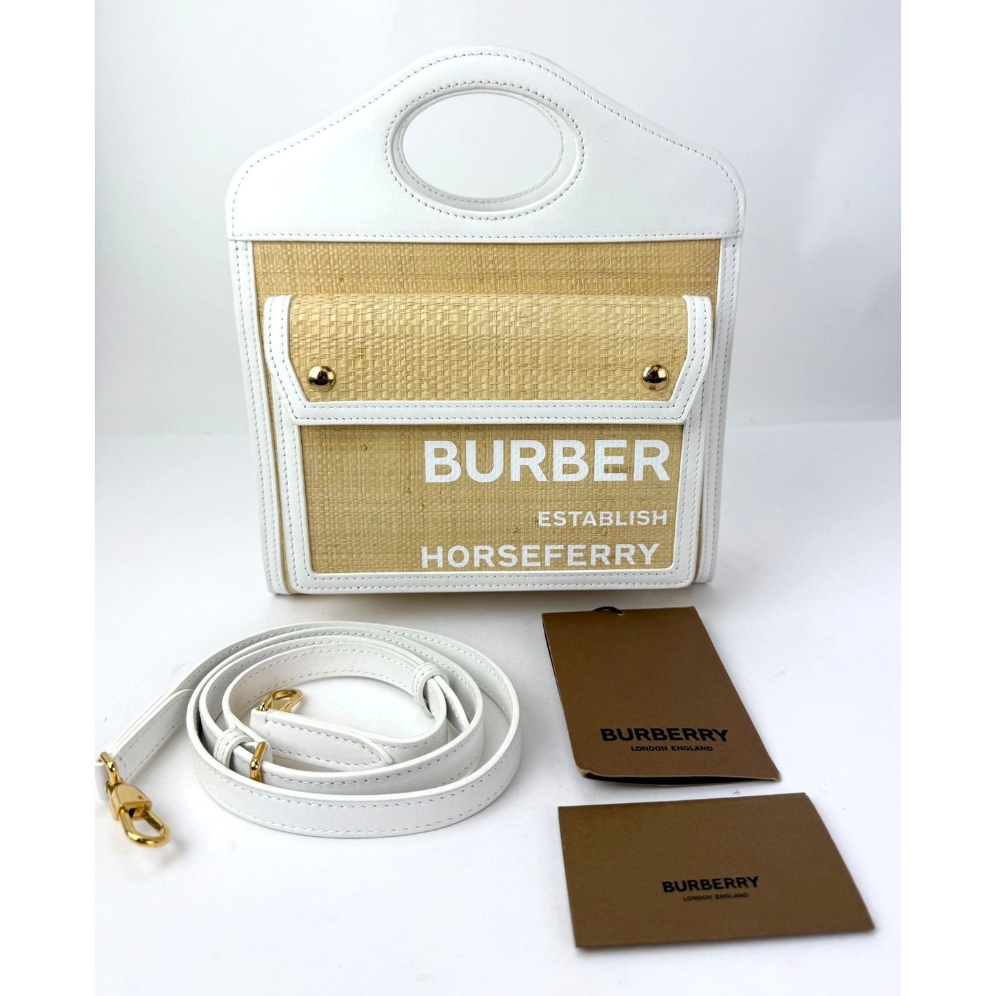 
                  
                    Burberry White Leather & Natural Raffia Mini Pocket Bag
                  
                