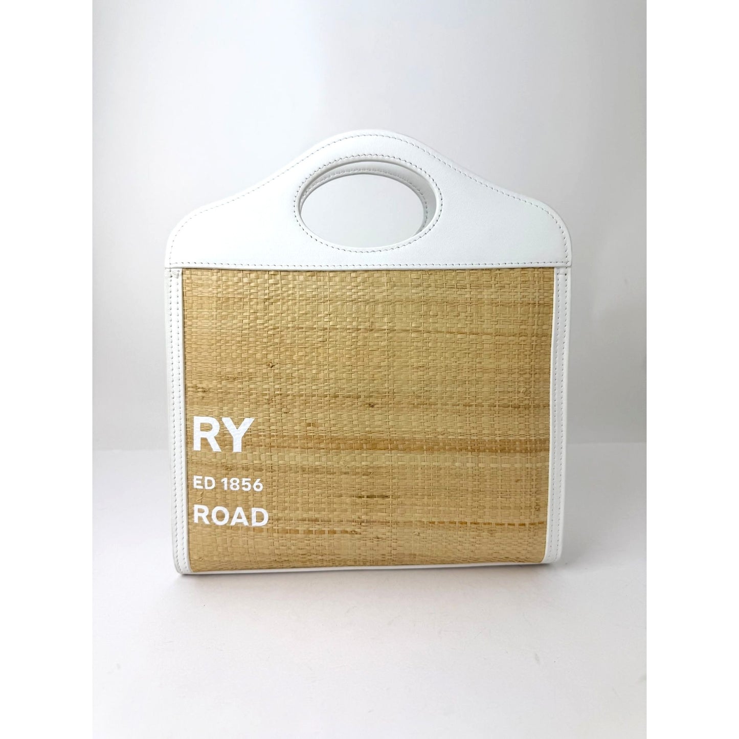 
                  
                    Burberry White Leather & Natural Raffia Mini Pocket Bag
                  
                