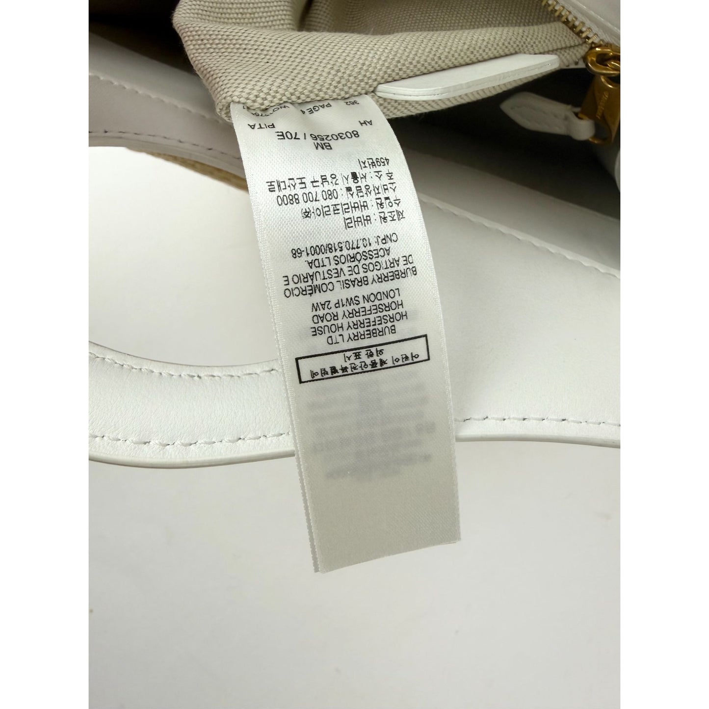 
                  
                    Burberry White Leather & Natural Raffia Mini Pocket Bag
                  
                
