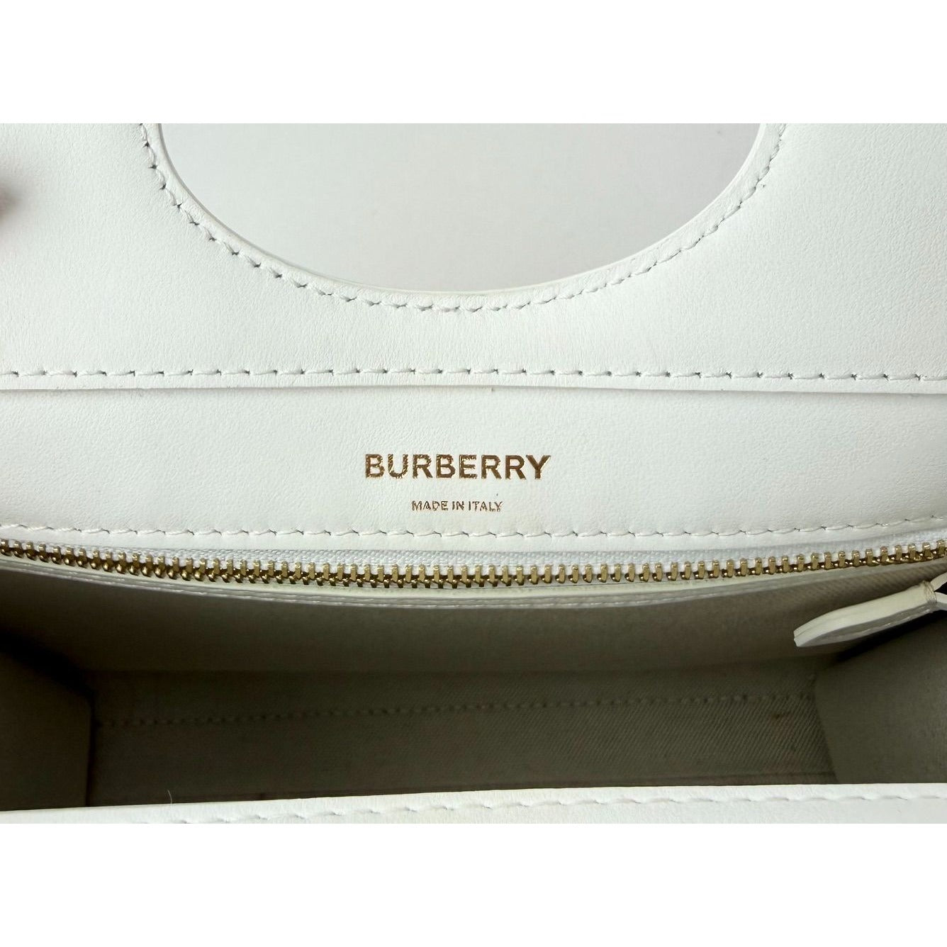 
                  
                    Burberry White Leather & Natural Raffia Mini Pocket Bag
                  
                