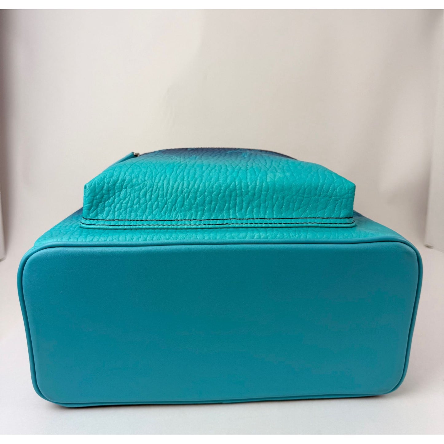 
                  
                    MCM Stark Ceramic Blue Gradation Palm Canvas Backpack
                  
                