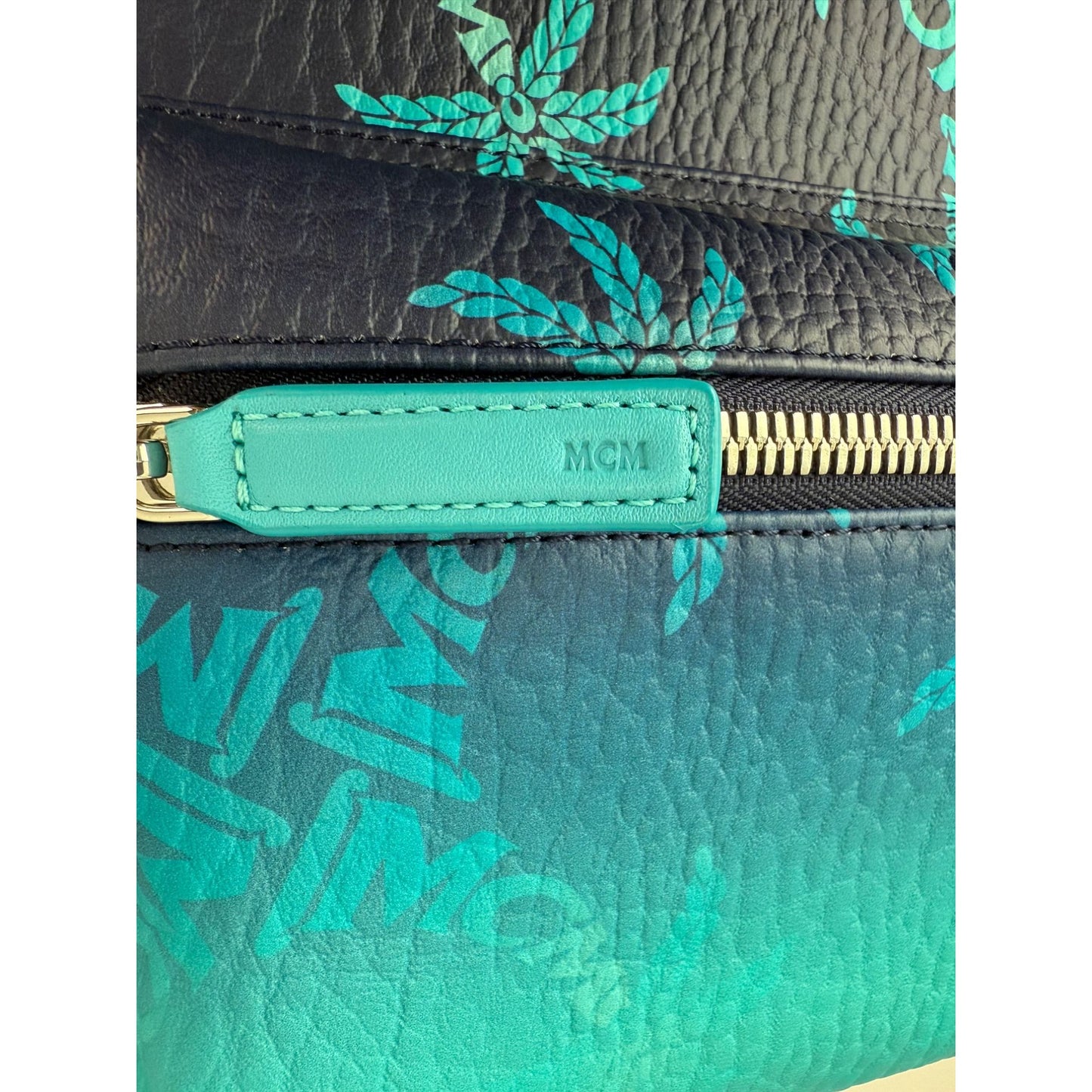 
                  
                    MCM Stark Ceramic Blue Gradation Palm Canvas Backpack
                  
                