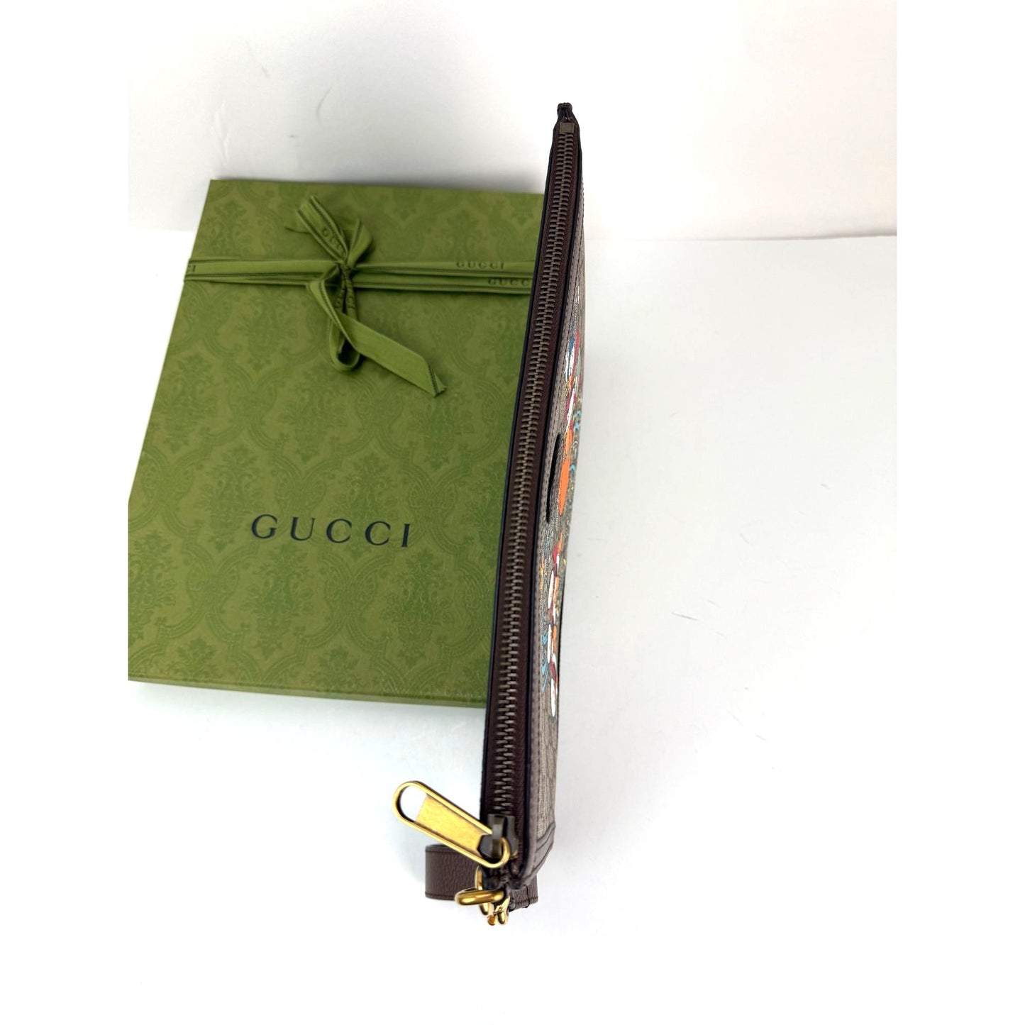 
                  
                    Gucci Disney Donald Duck GG Supreme Zip Beige Clutch Wristlet Bag
                  
                