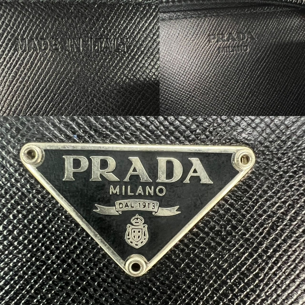 
                  
                    Prada Black Saffiano Leather Triangle Compact Zip Around Wallet
                  
                