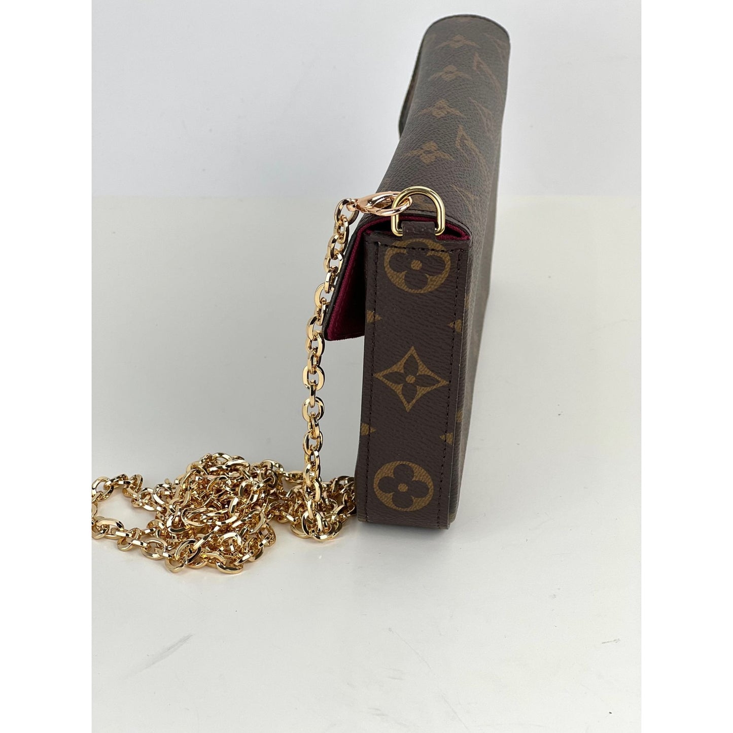 
                  
                    LOUIS VUITTON Felicie Pochette Monogram Canvas Crossbody Clutch
                  
                