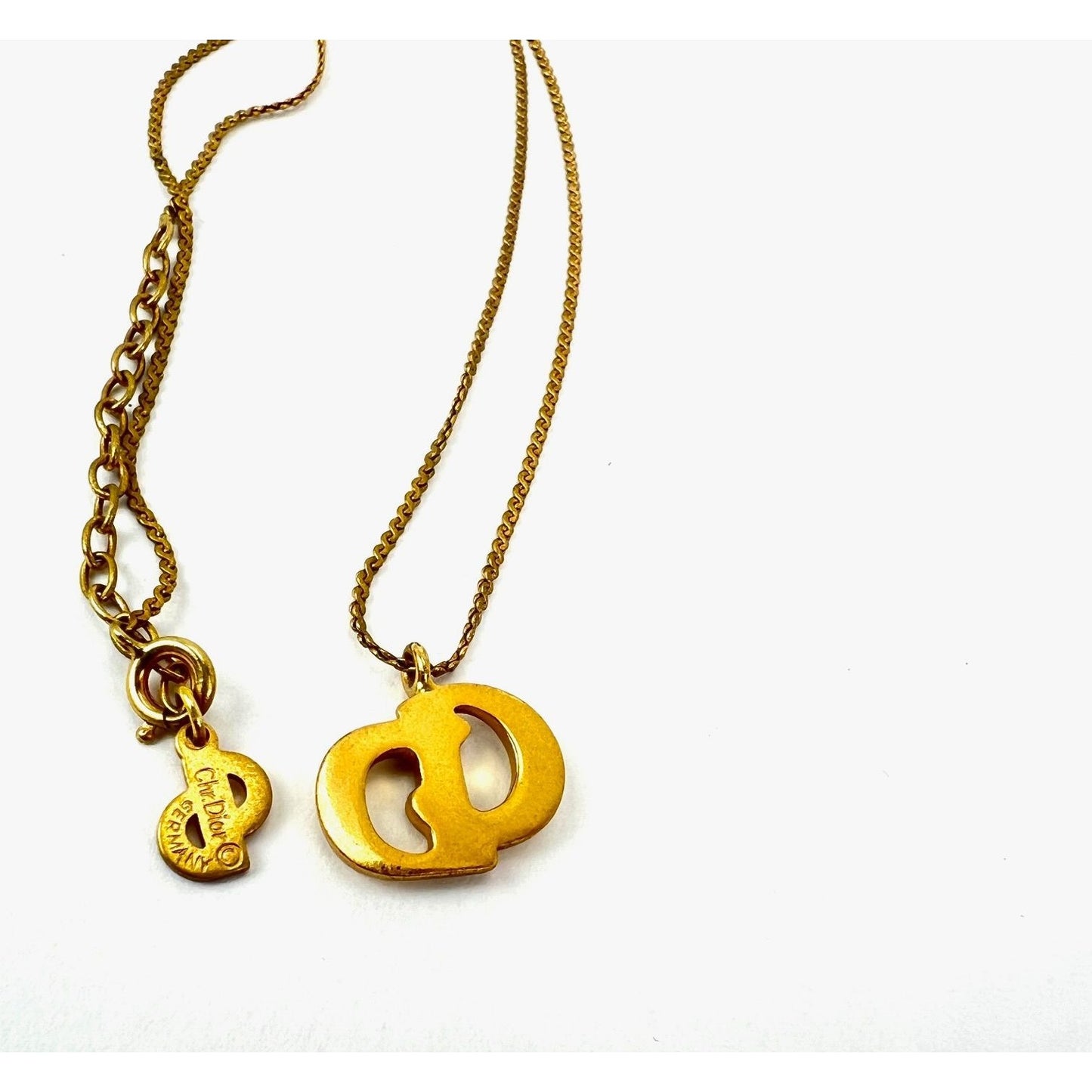 
                  
                    Christian Dior Gold Plated CD Pendent Necklace
                  
                