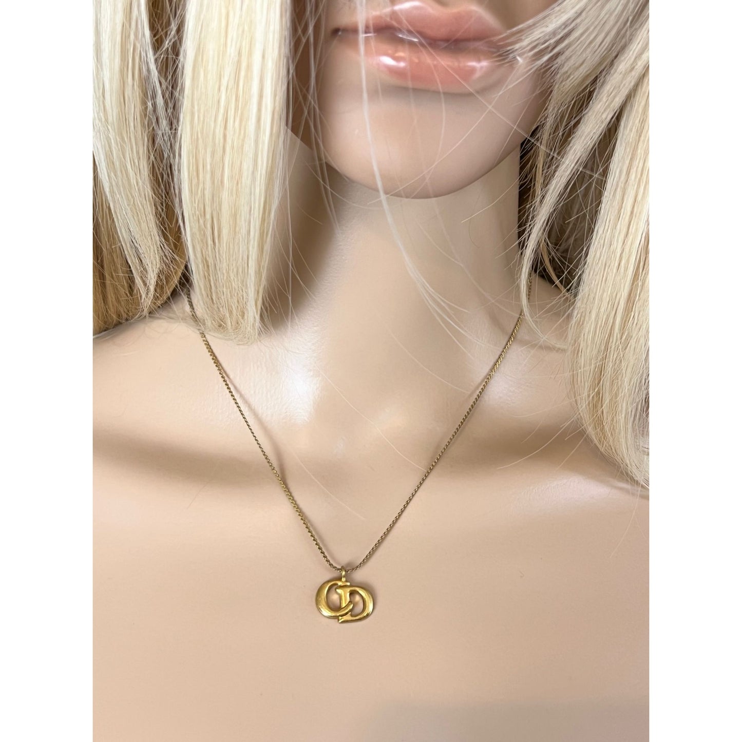 
                  
                    Christian Dior Gold Plated CD Pendent Necklace
                  
                