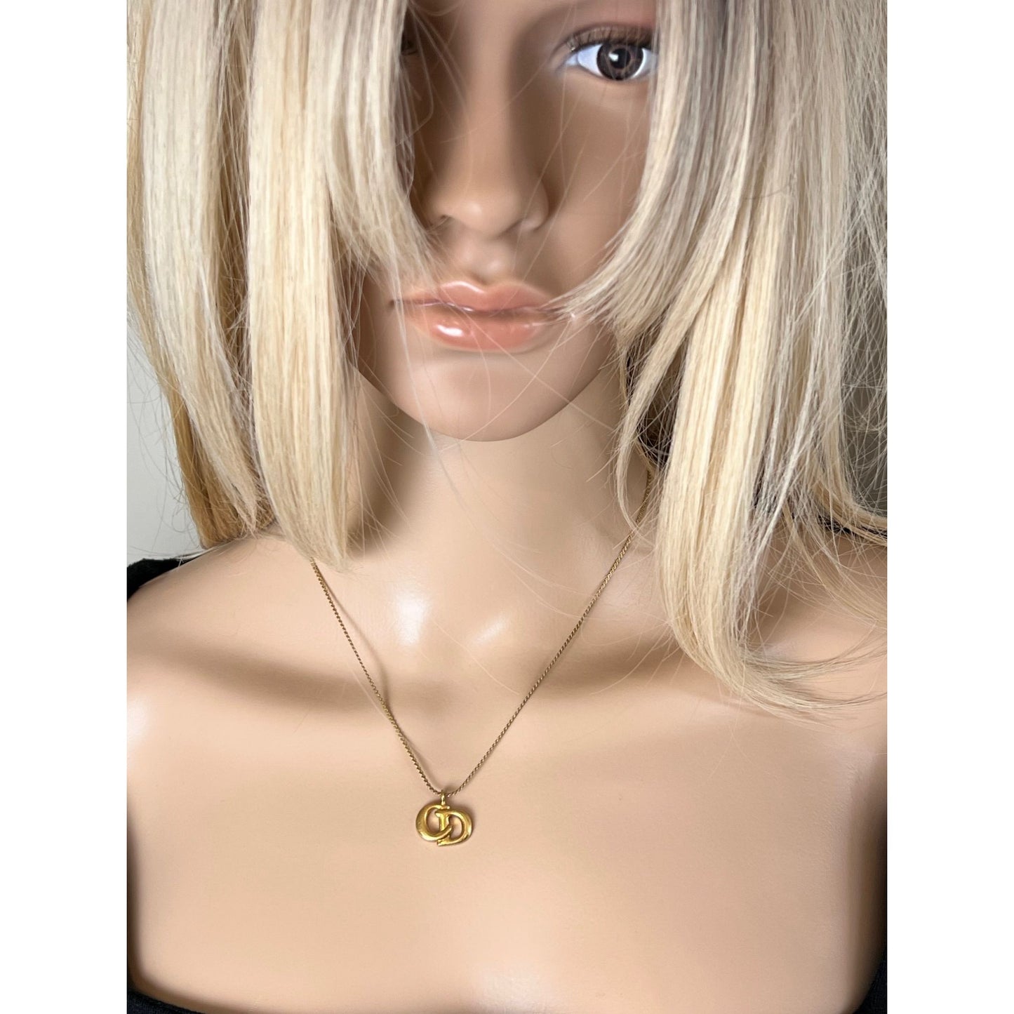 
                  
                    Christian Dior Gold Plated CD Pendent Necklace
                  
                