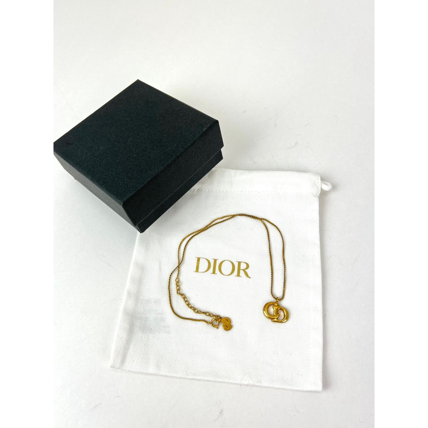 
                  
                    Christian Dior Gold Plated CD Pendent Necklace
                  
                