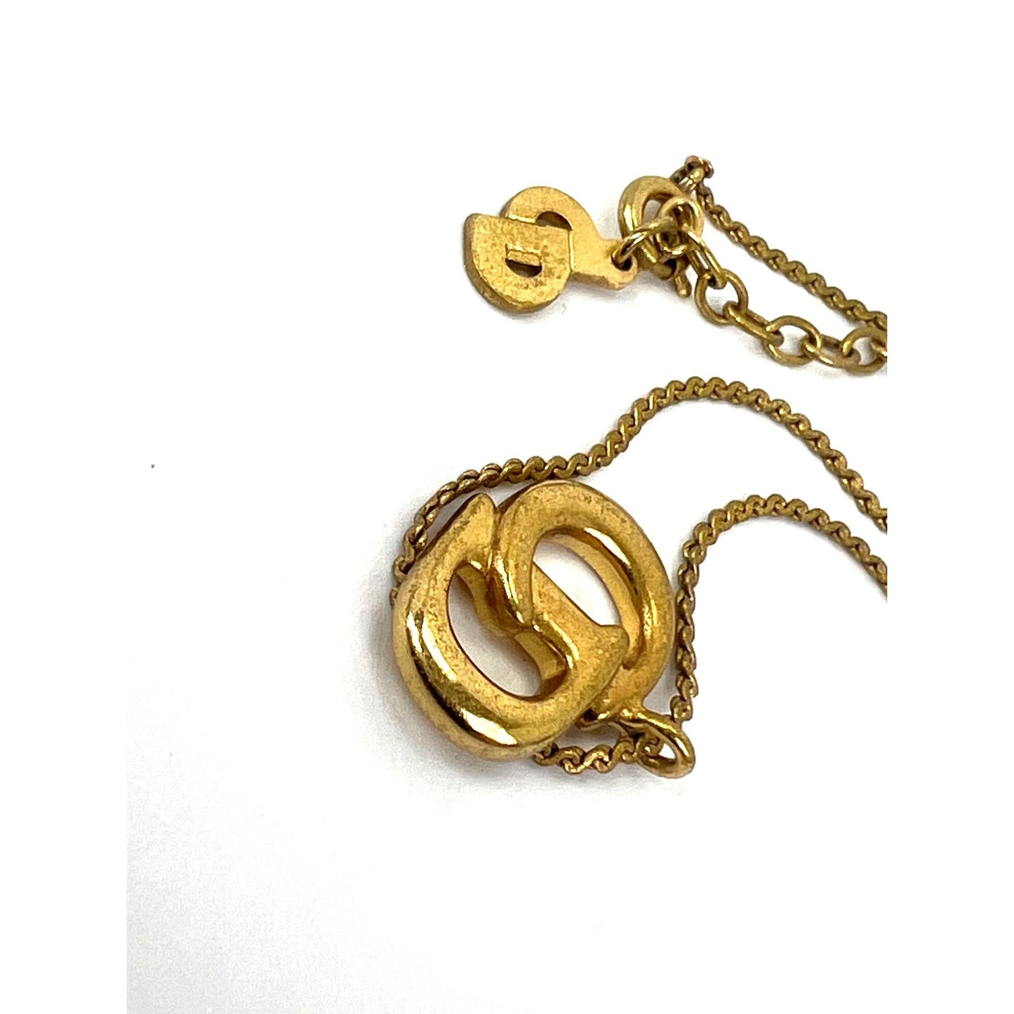 
                  
                    Christian Dior Gold Plated CD Pendent Necklace
                  
                