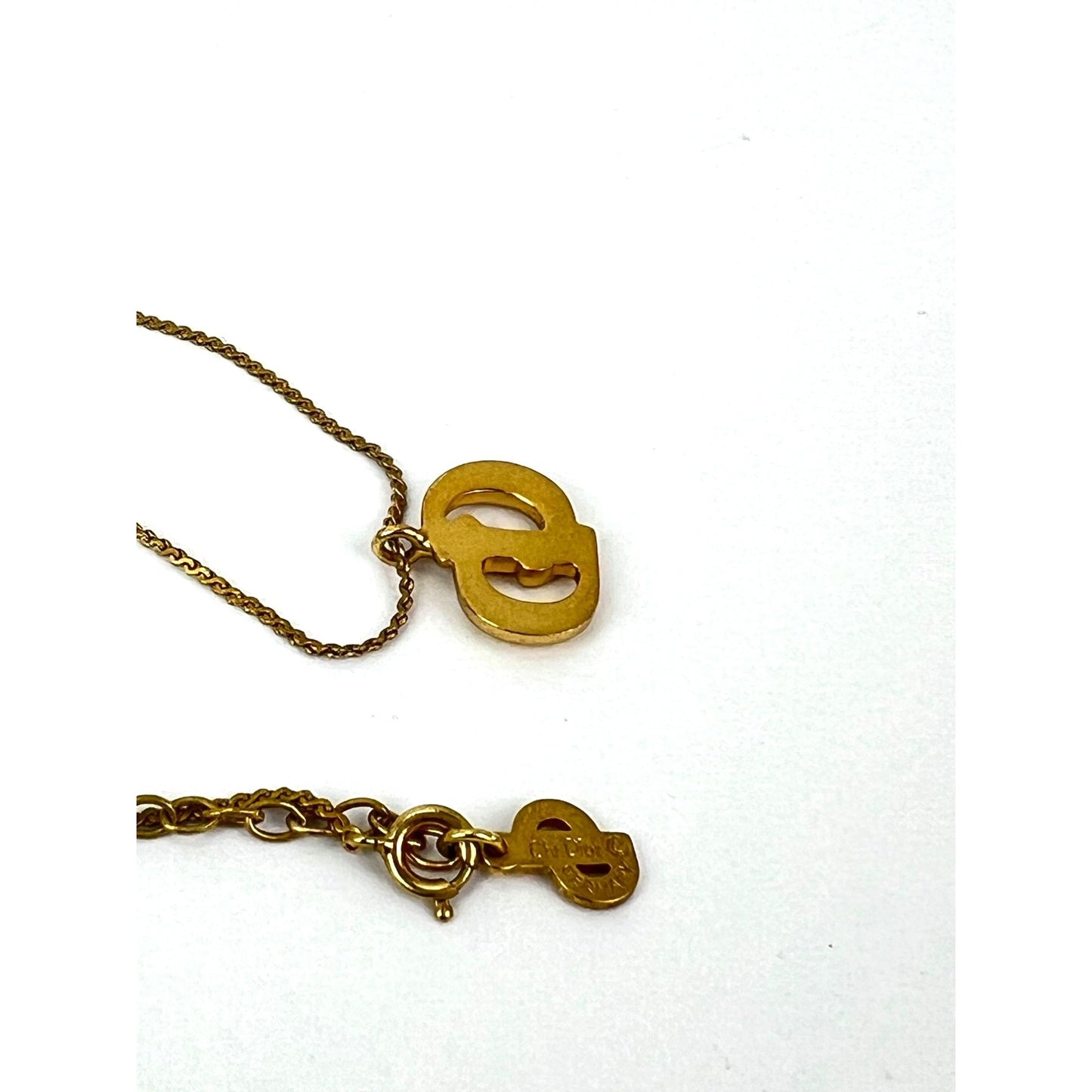 
                  
                    Christian Dior Gold Plated CD Pendent Necklace
                  
                