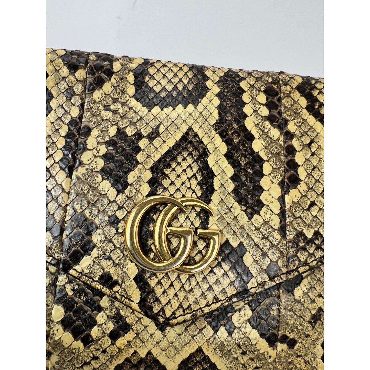 
                  
                    Gucci Thiara Double Sided Black Leather Python Crossbody Bag
                  
                