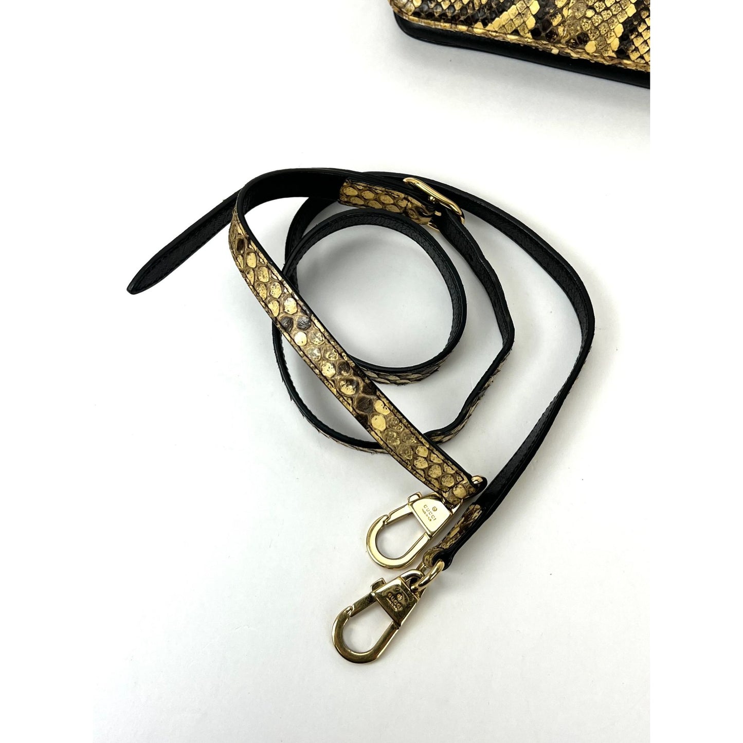 
                  
                    Gucci Thiara Double Sided Black Leather Python Crossbody Bag
                  
                