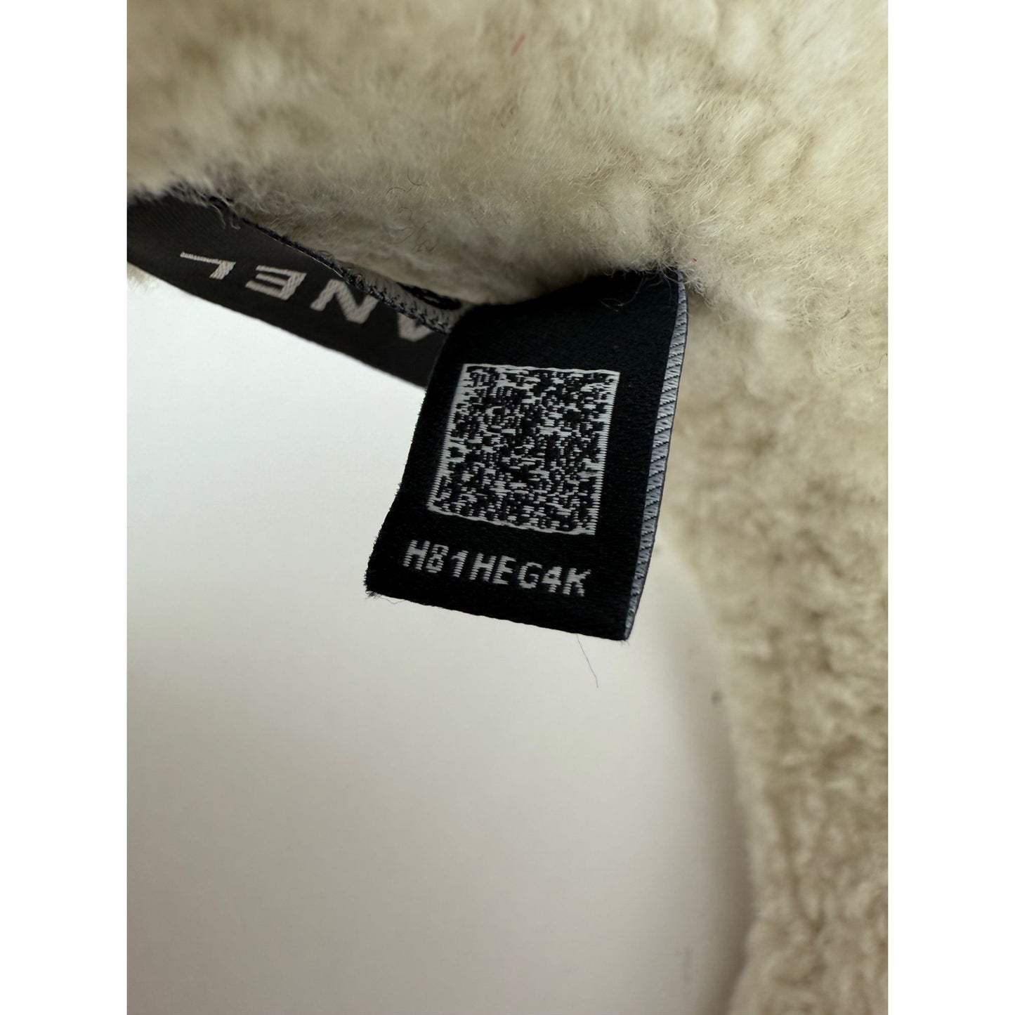 
                  
                    Chanel Shearling Logo Ecru Black Headband
                  
                