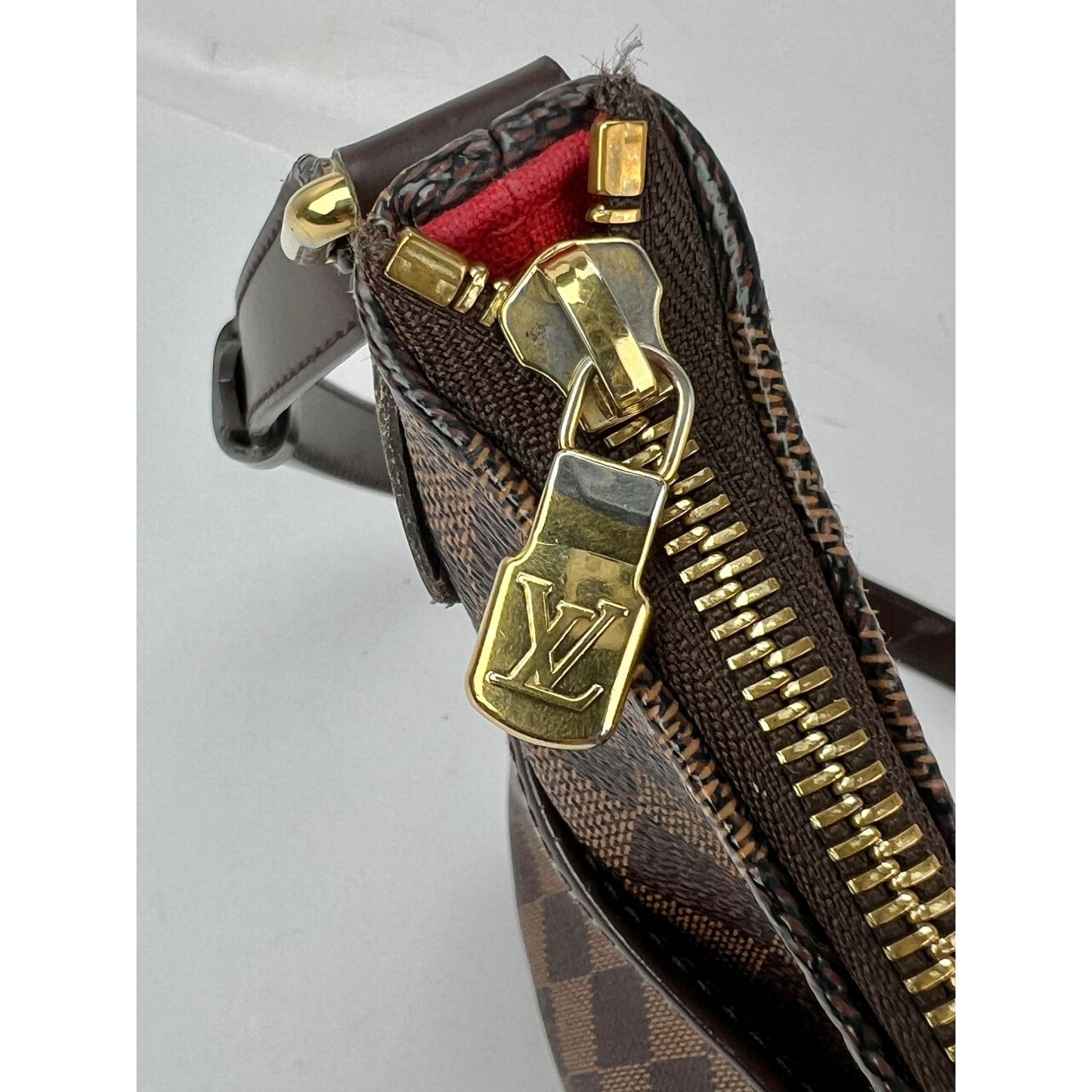 
                  
                    Louis Vuitton Damier Ebene Bloomsbury PM Messenger Crossbody
                  
                