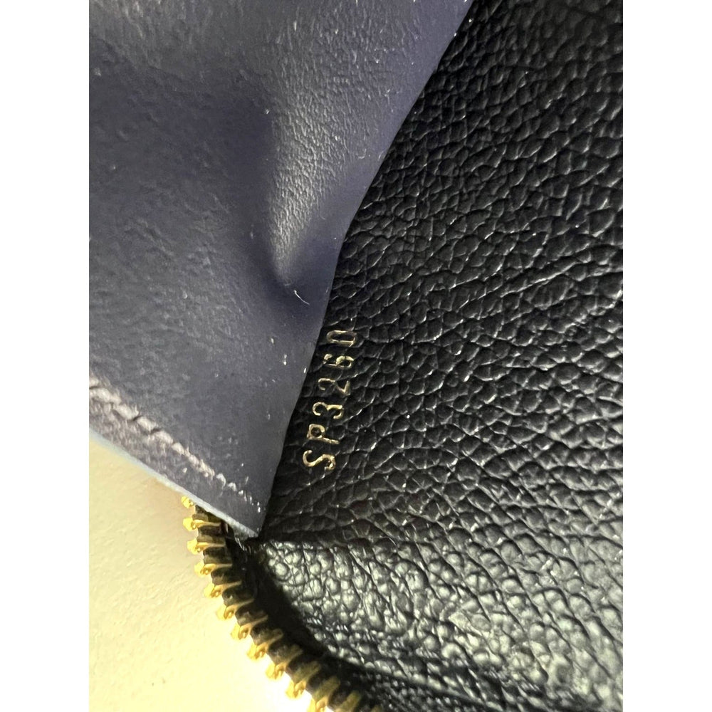 
                  
                    LOUIS VUITTON Clemence Empreinte Leather Blue Wallet Clutch
                  
                