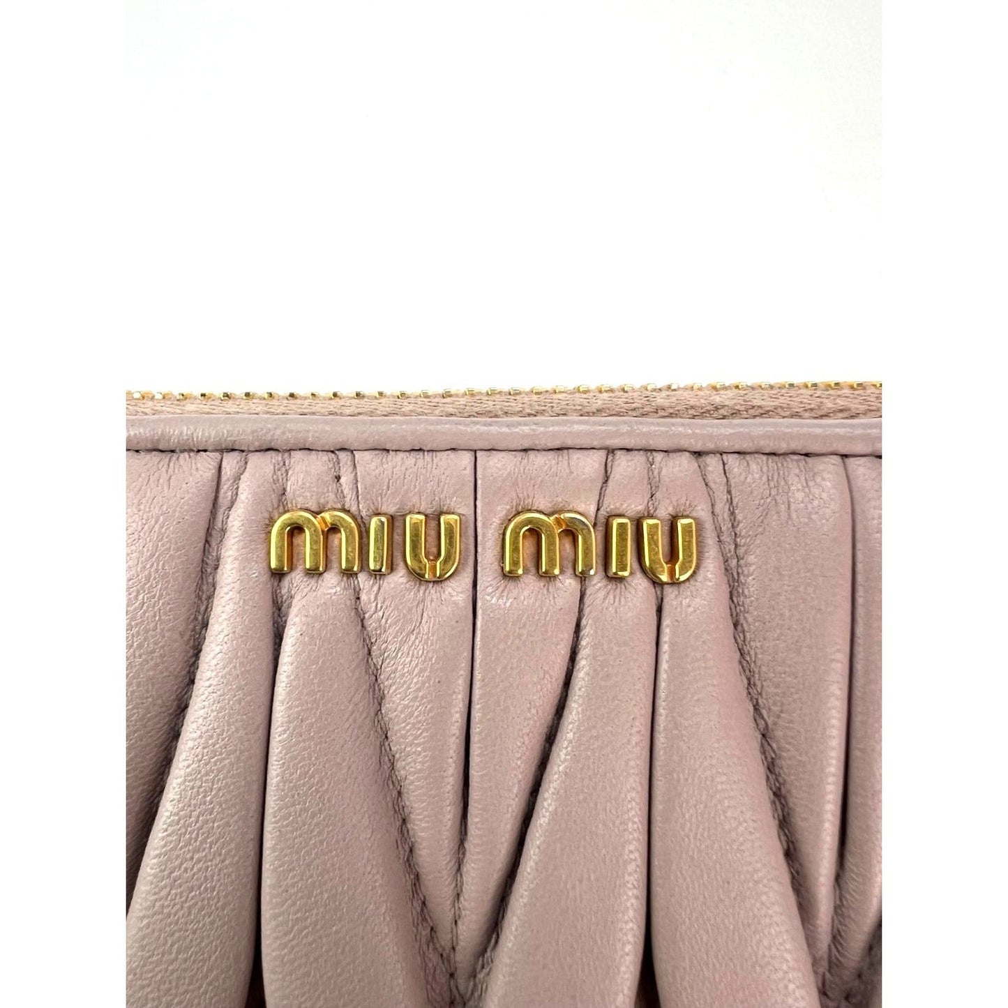 
                  
                    Miu Miu Long Beige Zip Around Leather Wallet
                  
                