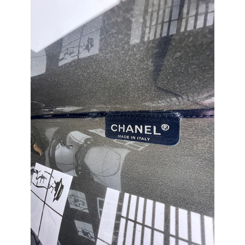 
                  
                    Chanel Vinyl Coco Window Black Tote
                  
                