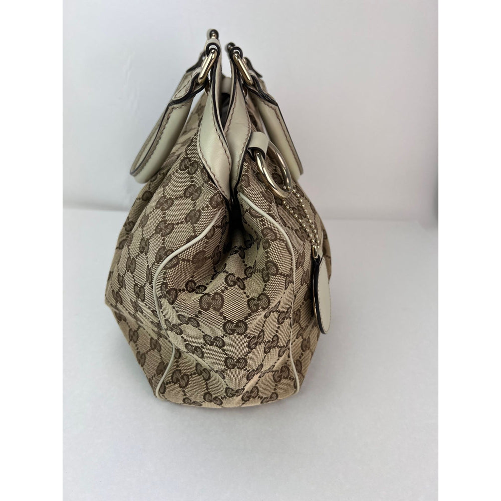 
                  
                    Gucci Sukey Guccissima GG Canvas Medium Hobo Shoulder Bag
                  
                