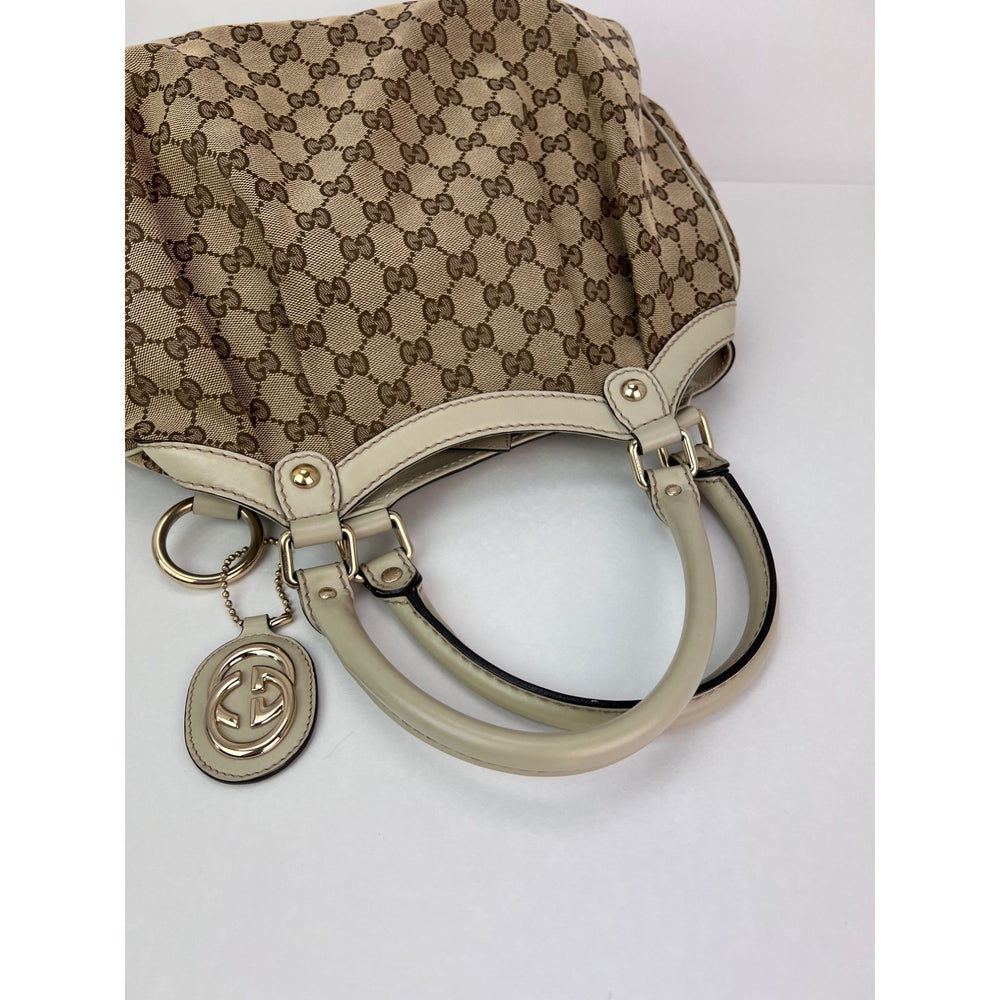 
                  
                    Gucci Sukey Guccissima GG Canvas Medium Hobo Shoulder Bag
                  
                