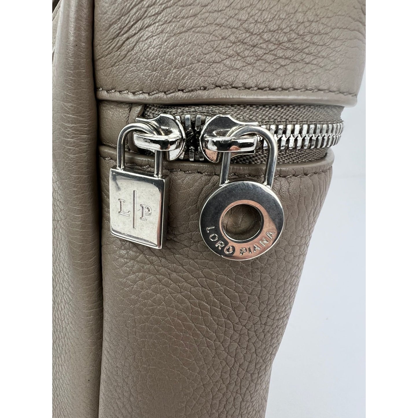 
                  
                    Loro Piana Grained Calfskin 23.5 Extra Pocket Warm Mastic Backpack
                  
                