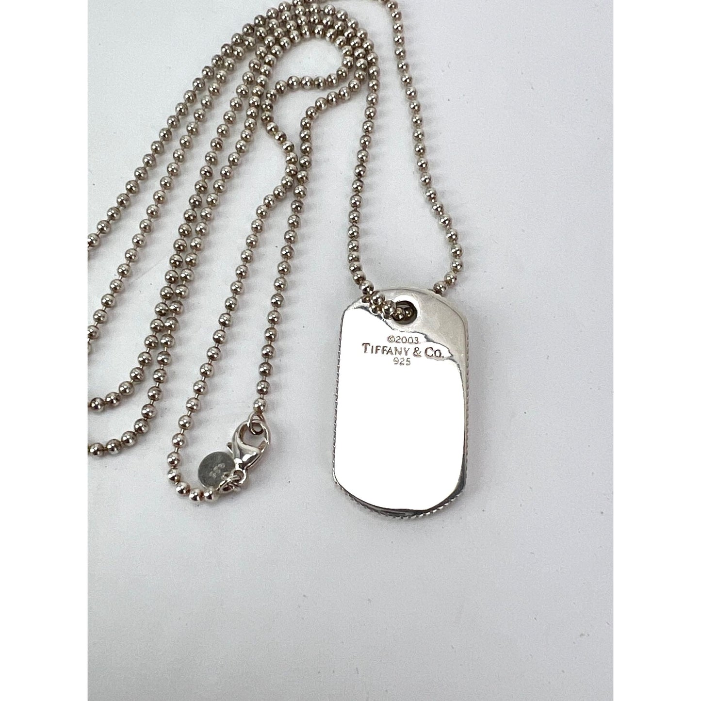 
                  
                    Tiffany Sterling Silver Dog Tag Pendant on Sterling Silver Chain Necklace
                  
                