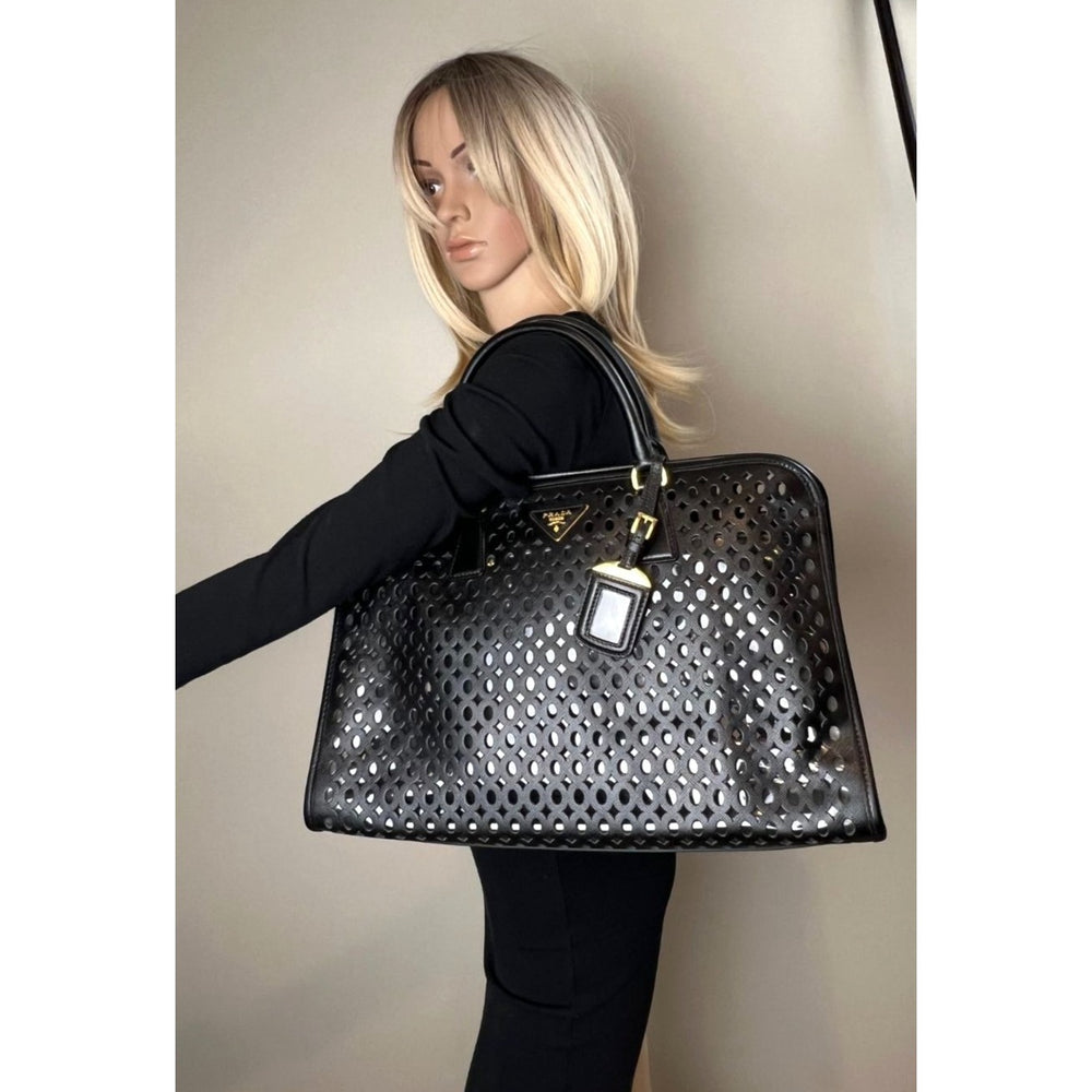 
                  
                    Prada Saffiano Vernice Perforated Black Leather Beach Pool Tote
                  
                