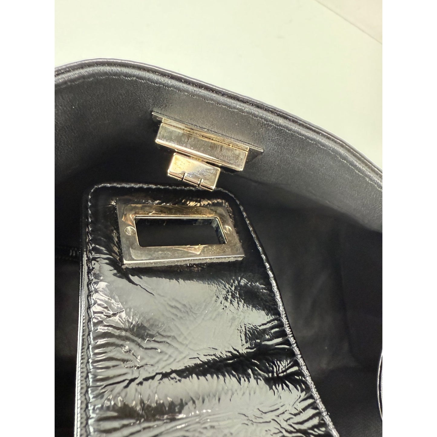 
                  
                    Chanel Patent Mademoiselle lock Convertible Wrist Clutch Black Bag
                  
                