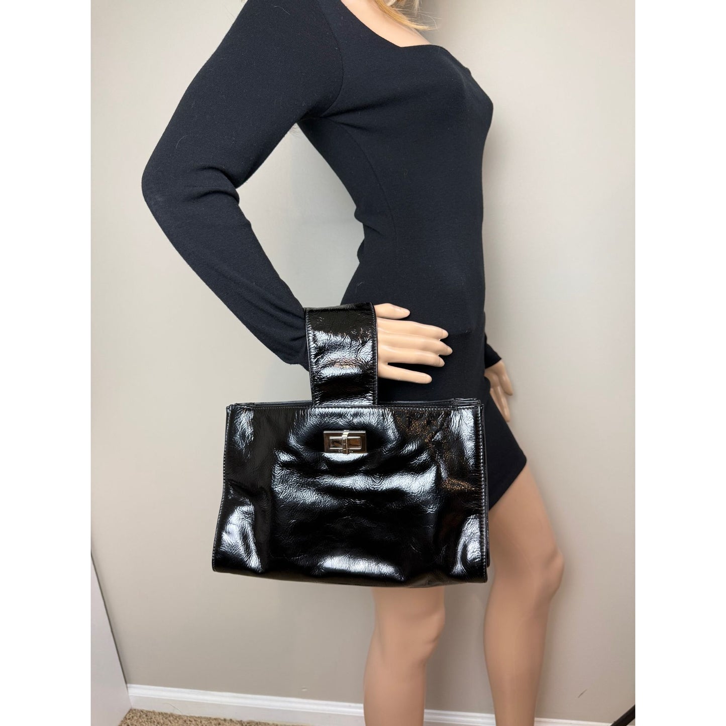 
                  
                    Chanel Patent Mademoiselle lock Convertible Wrist Clutch Black Bag
                  
                