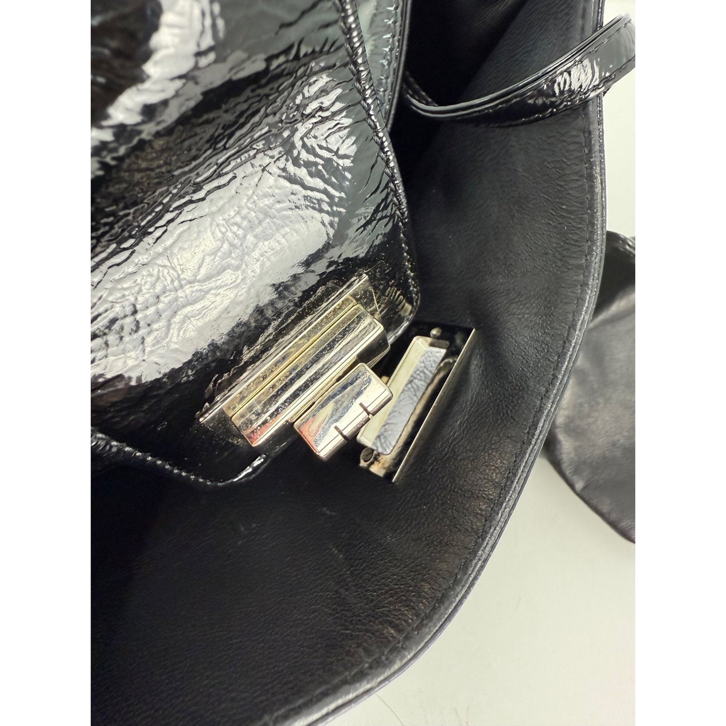 
                  
                    Chanel Patent Mademoiselle lock Convertible Wrist Clutch Black Bag
                  
                