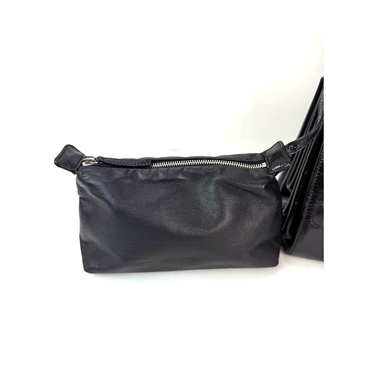 
                  
                    Chanel Patent Mademoiselle lock Convertible Wrist Clutch Black Bag
                  
                