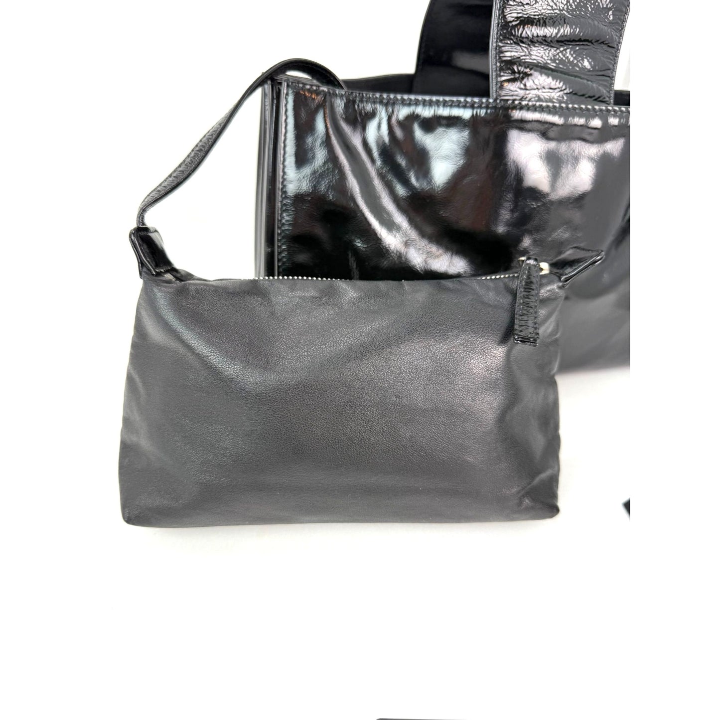 
                  
                    Chanel Patent Mademoiselle lock Convertible Wrist Clutch Black Bag
                  
                