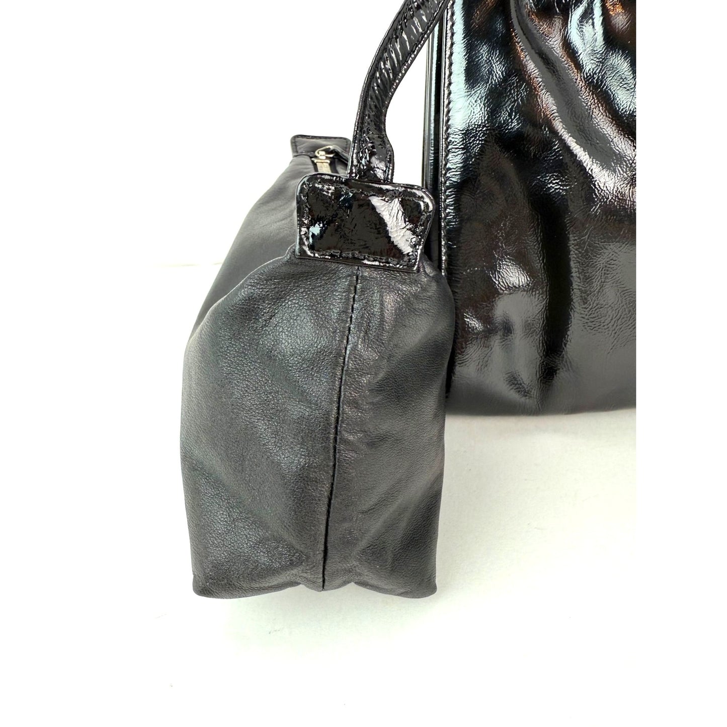 
                  
                    Chanel Patent Mademoiselle lock Convertible Wrist Clutch Black Bag
                  
                